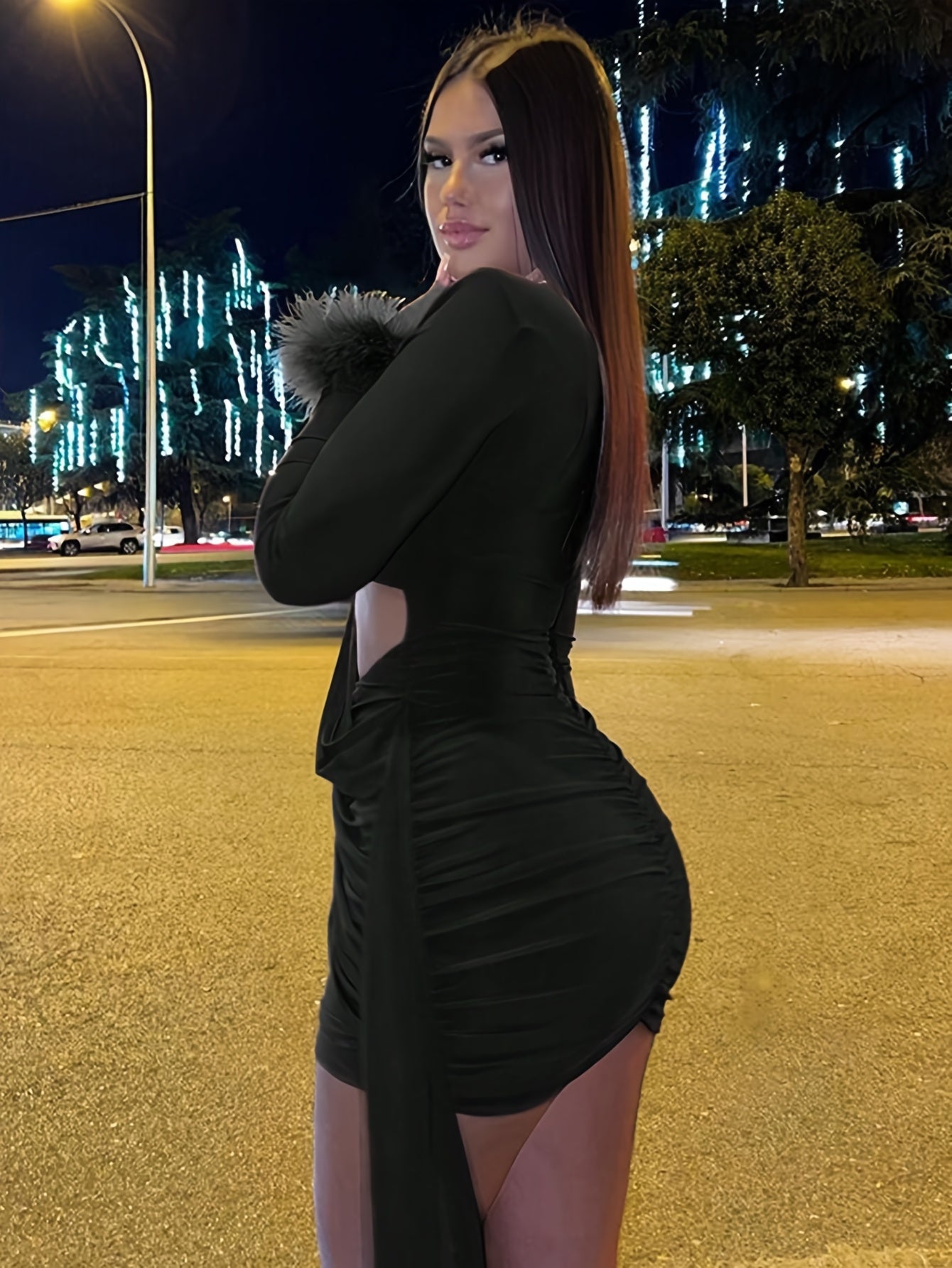 Fall Figure-Hugging Mini Dress Featuring Fuzzy Cuff Accents And a Cutout Design.