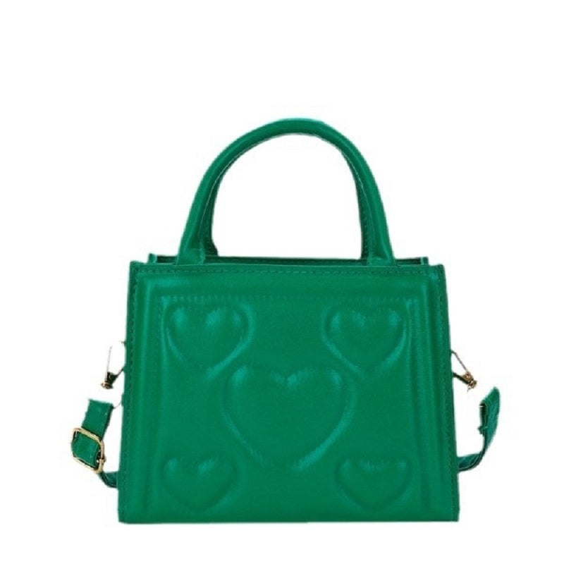 1pc Women’s Stylish Solid Color Handbag with Detachable Strap – Heart Pattern Design, Perfect for Valentine’s Day Gift, Available in Magenta, White, Black, Green, Yellow