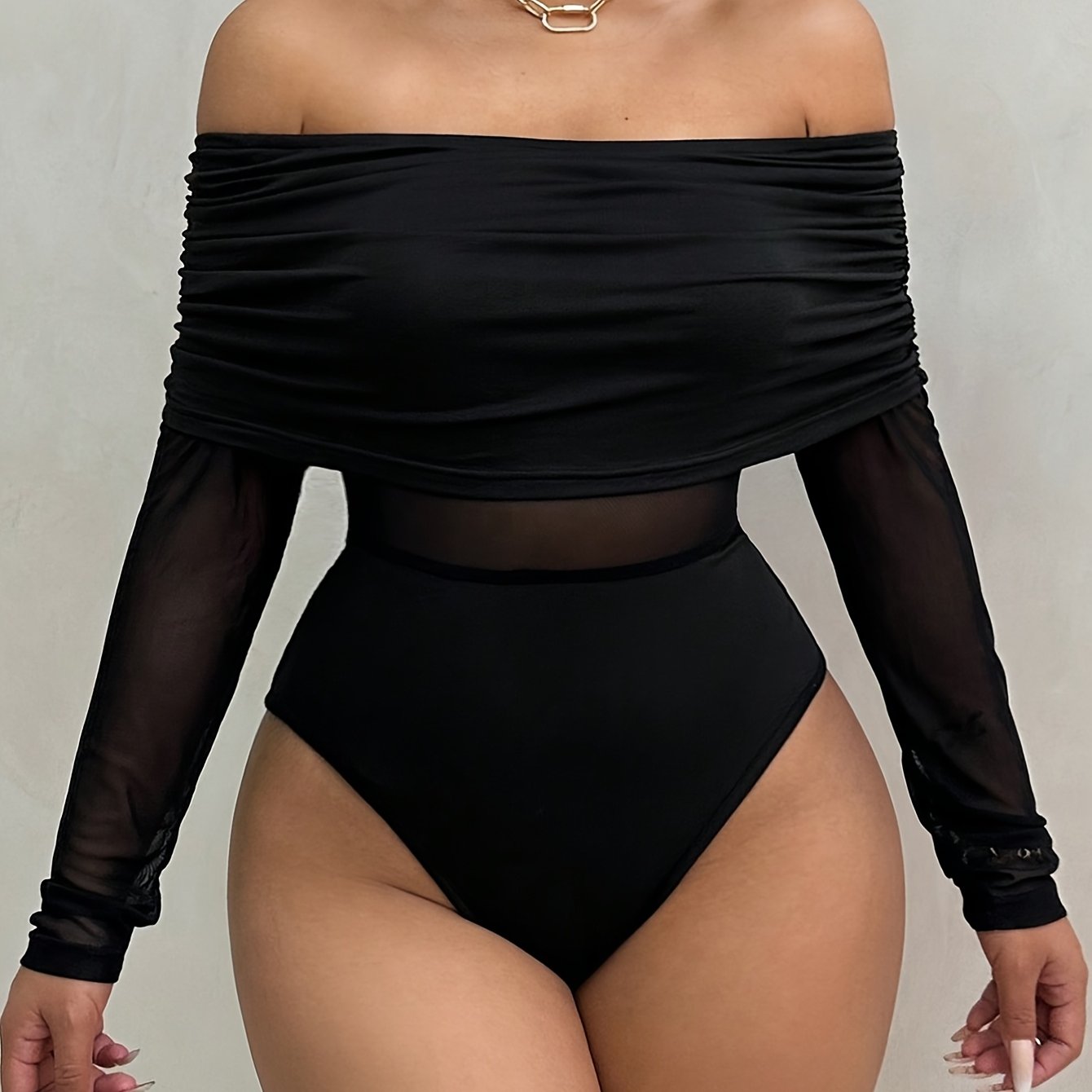 Elegant Off-Shoulder Long Sleeve Knit Bodysuit with Mesh Detail - High Stretch, Solid Black, Ruched Design, Perfect for Fall/Winter Women’s Fashion, Fall Fashion Top | Offshoulder Bodysuit | Nontransparent Fabric