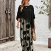 A Two-Piece Women'S Solid Color Round Neck Asymmetrical Hem Shirt And All-Over Printed Pants Set.