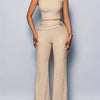 Women'S Elegant Beige Polyester Asymmetrical Neck Top & Flared Pants Set - Solid Color, Ribbed Texture, Belted Waist, Perfect for All Seasons