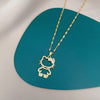 Elegant Sanrio Hello Kitty Golden Pendant Necklace - Chic Stainless Steel with Sparkling Synthetic Gems, Perfect for Weddings & Daily Wear, All-Season Versatile Clavicle Chain