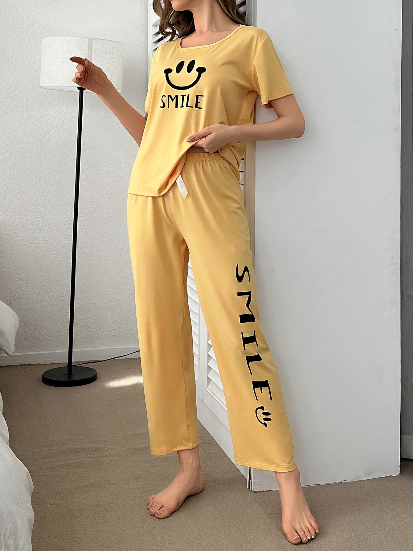 Women's Smiling Face & Letter Print Casual Pajama Set, Short Sleeve Round Neck Top & Pants, Comfortable Relaxed Fit
